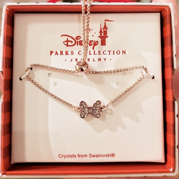 Disney Jewelry - DISNEY PARKS SWAROVSKI CRYSTAL BOW BRACELET